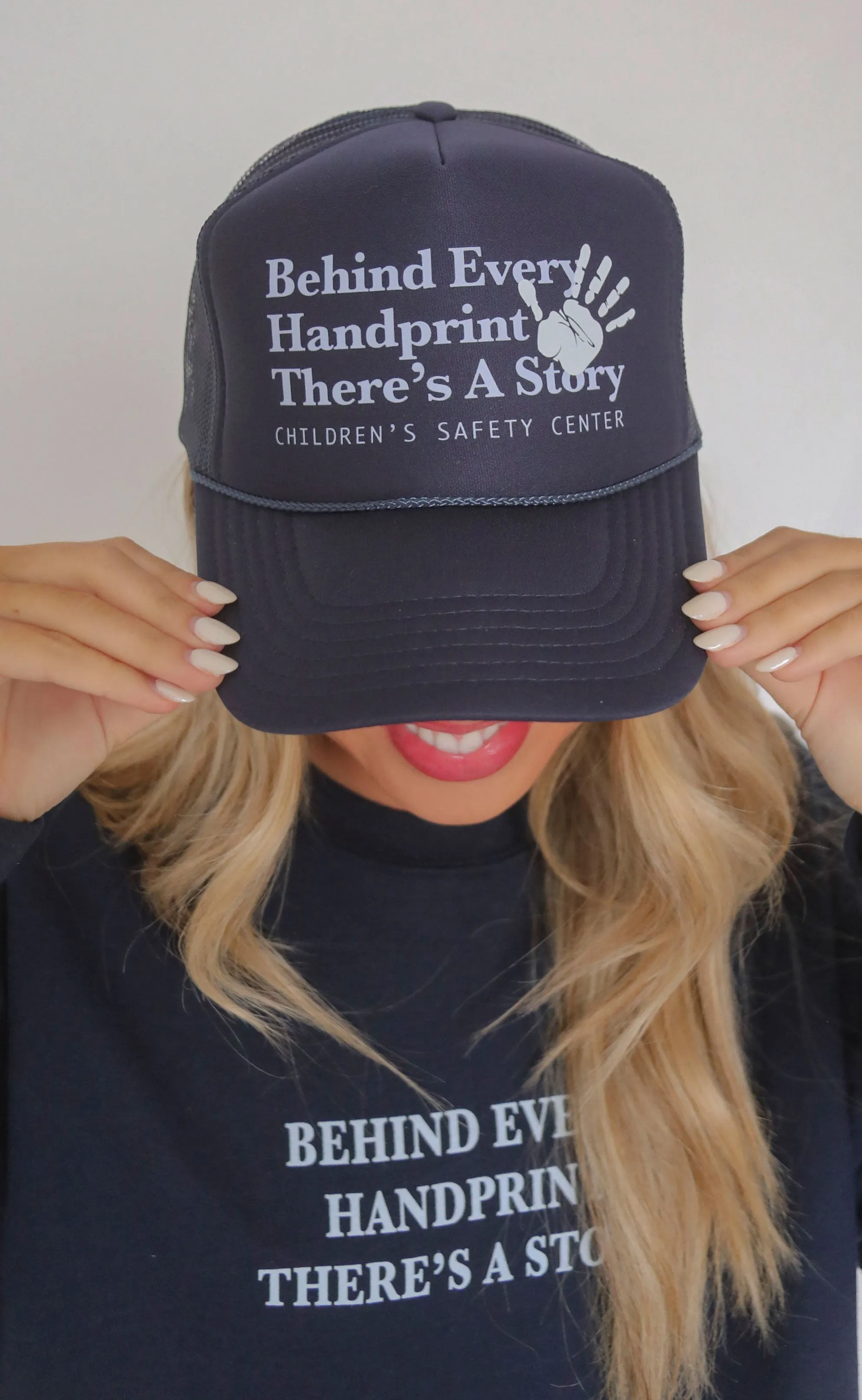 riffraff x child safety center trucker hat